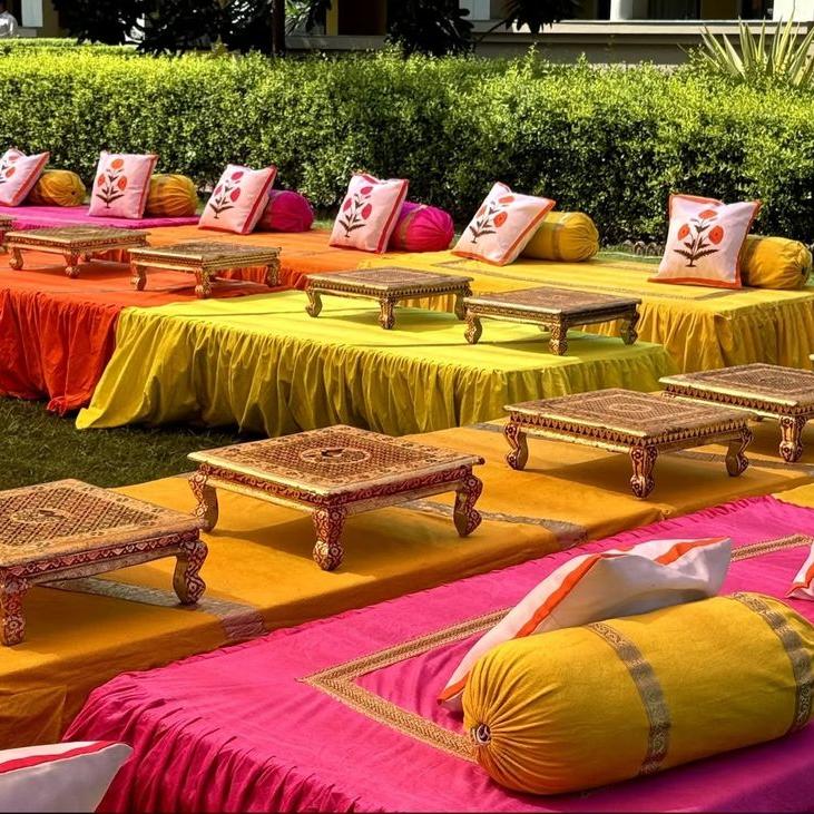 Royal Rajasthani Dining Experience Royal Rajasthani dining experience with traditional takhat seating and silver thali service at Utsav Marriage Garden, Bhopal.